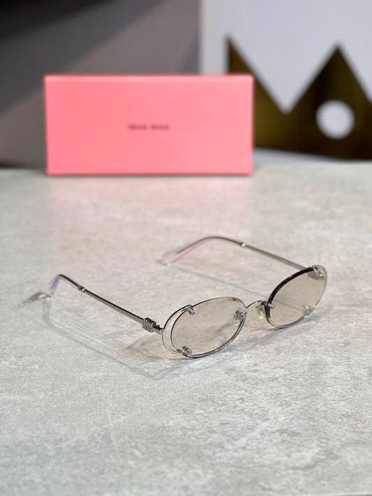 Gafas Miu Miu Ovalada Plateada Transparente