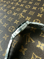 RELOJ TAG