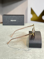 GAFAS PRADA OPTICA DORADA