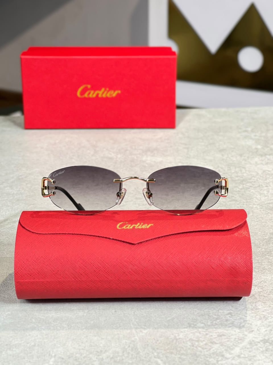Gafas Cartier Ovalada Humo Dorada