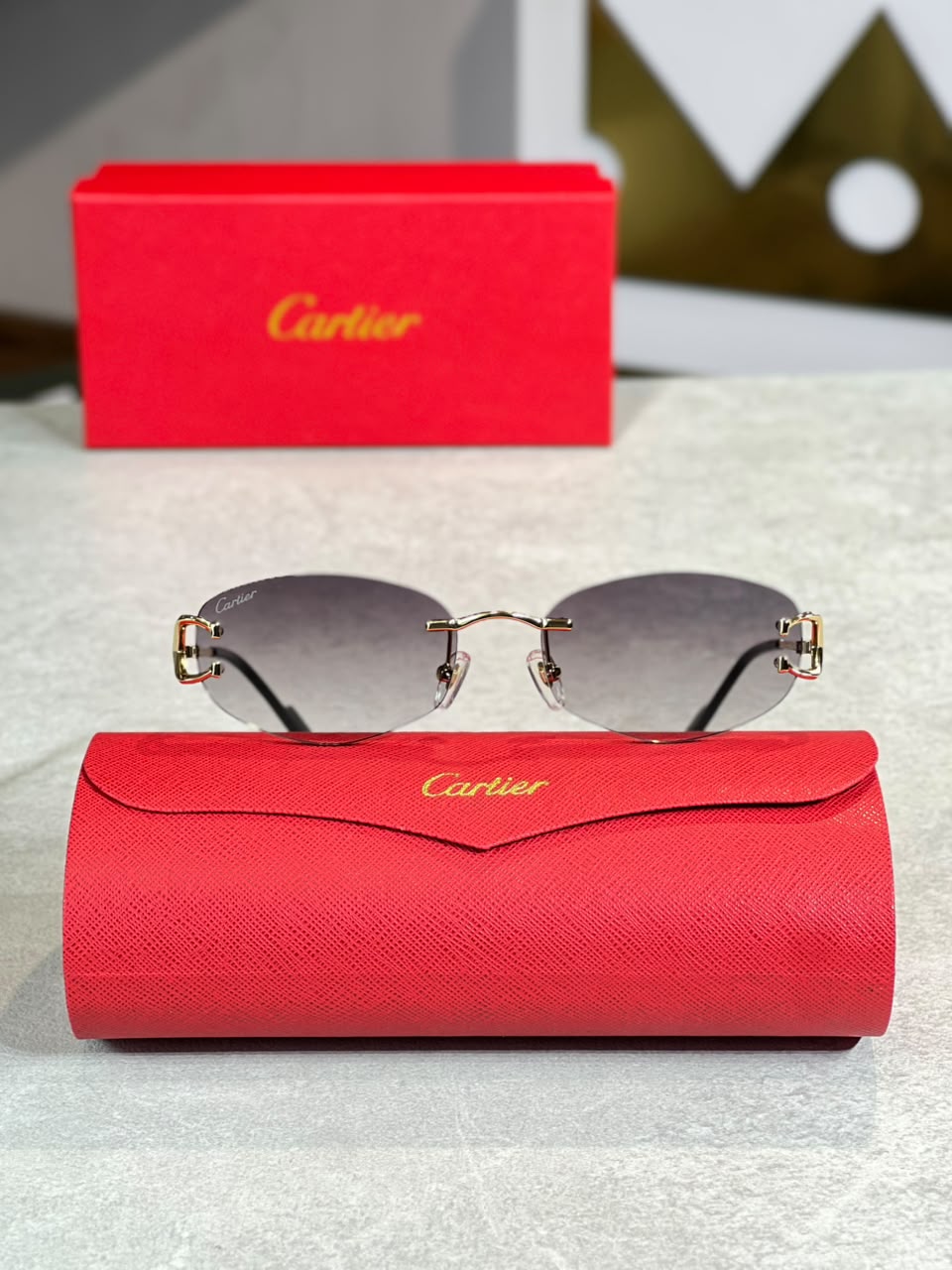 Gafas Cartier Ovalada Humo Dorada