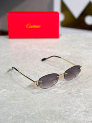 Gafas Fendi Ovalada Humo Dorada