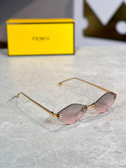 Gafas Fendi Ovalada Humo Dorada