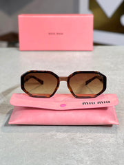 Gafas Miu Miu carey rectangular con estuche