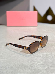 Gafas Miu Miu hexagonal carey