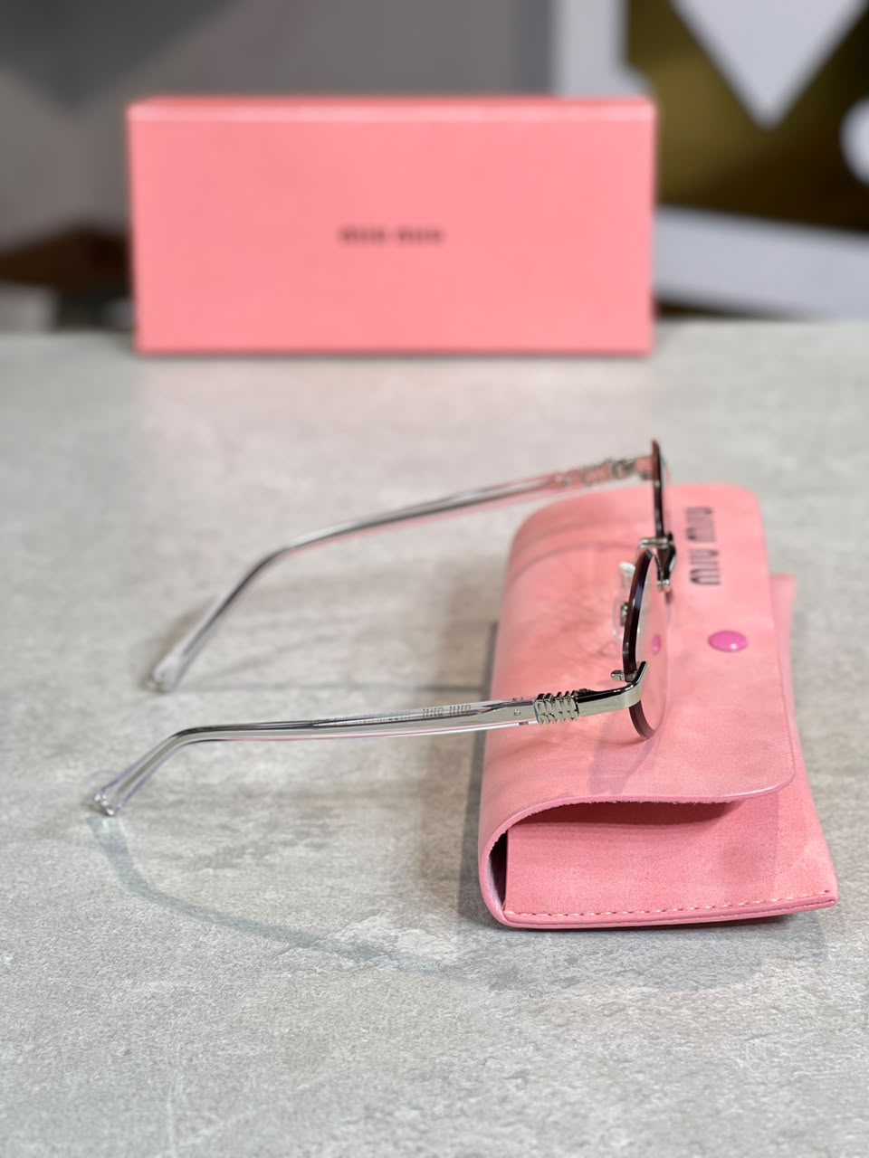 Gafas Miu Miu ovalada dorada transparente