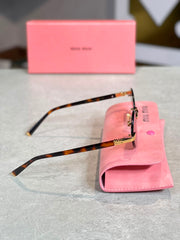 Gafas Miu Miu ovalada carey humo