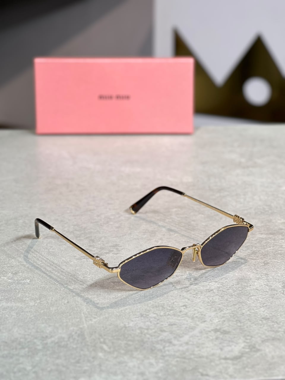 Gafas Miu Miu ovalada lila