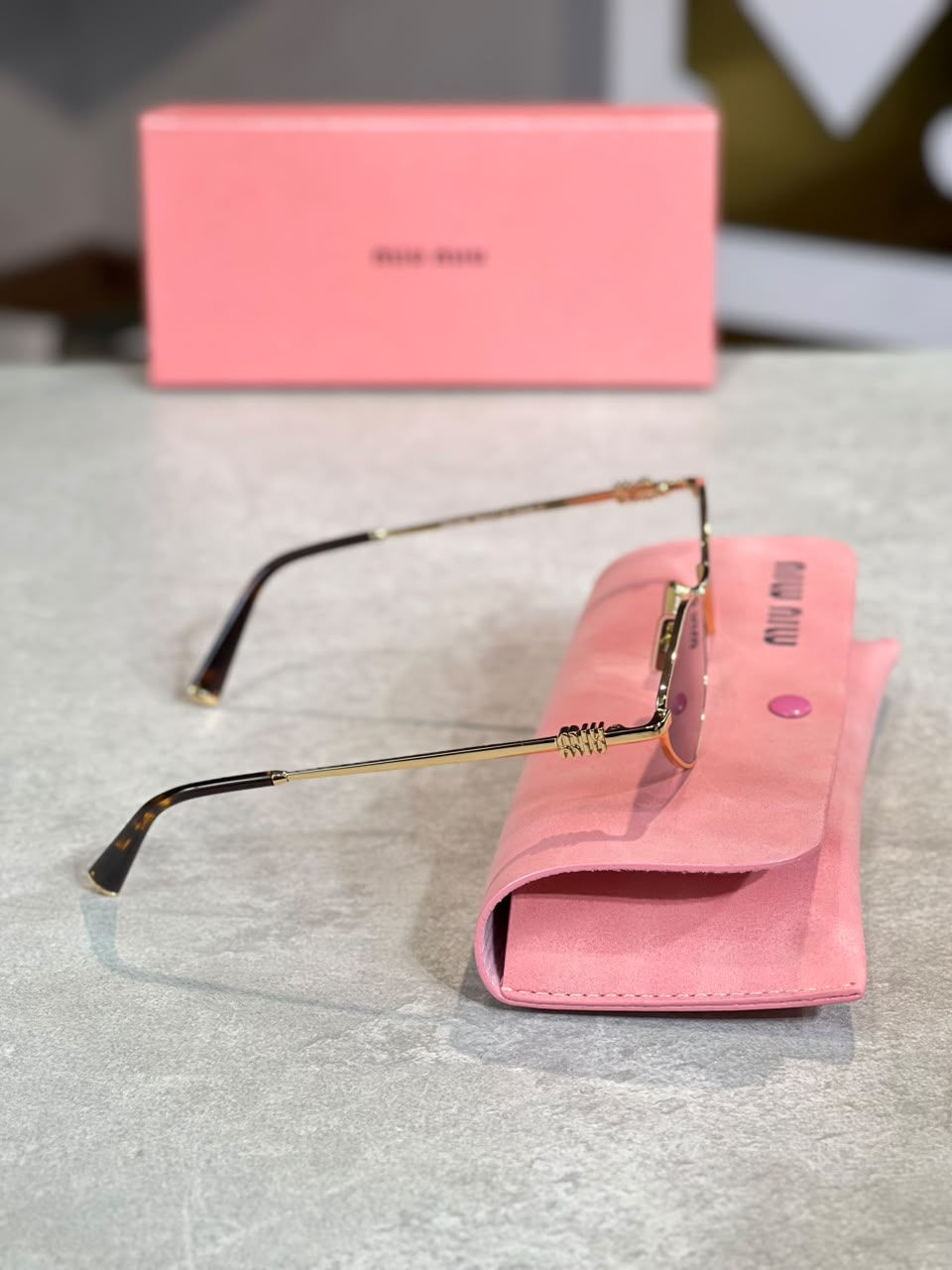 Gafas Miu Miu ovalada lila