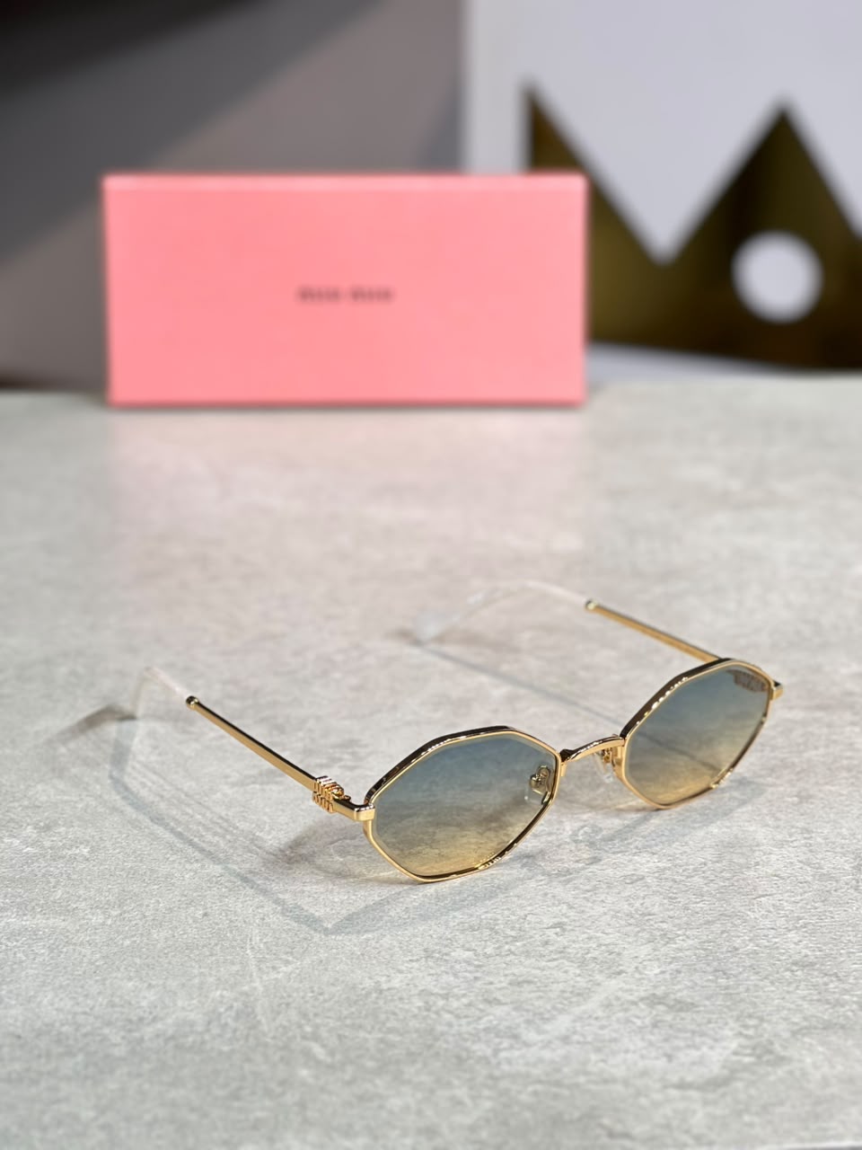 Gafas Miu Miu ovalada ambar