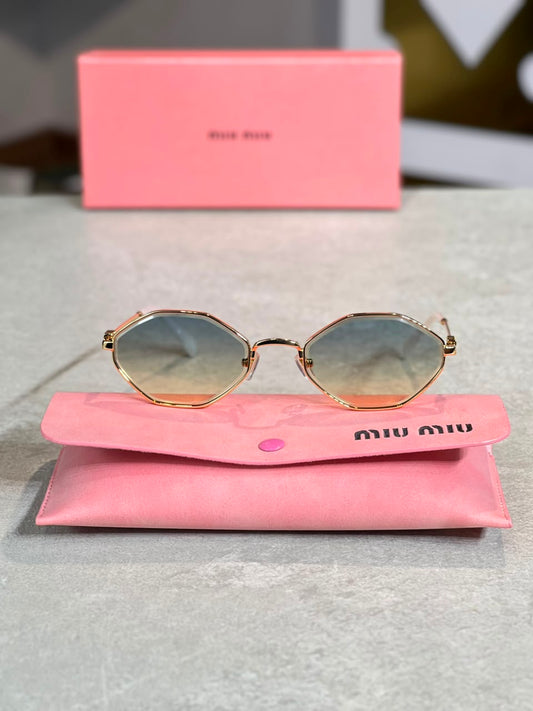 Gafas Miu Miu ovalada ambar