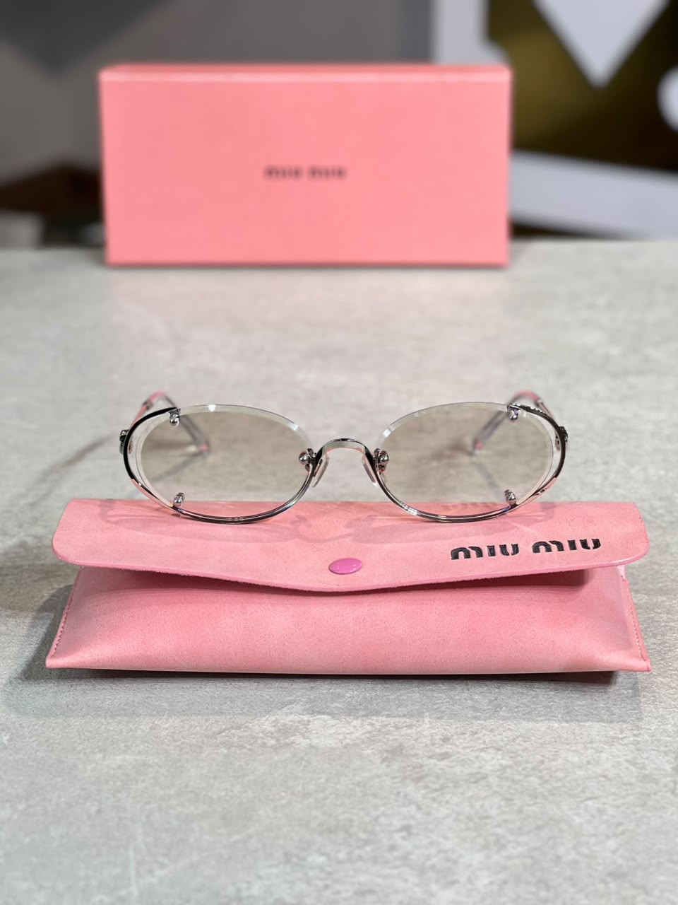 Gafas Miu Miu Ovalada Plateada Transparente