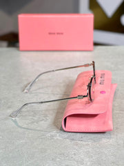 Gafas Miu Miu Ovalada Plateada Transparente