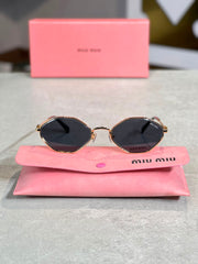Gafas Miu Miu Ovalada Vino