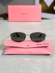 Gafas Miu Miu Rectangular Negra Metal