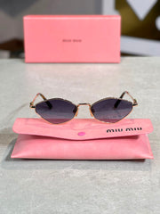 Gafas Miu Miu Ovalada Gris Humo