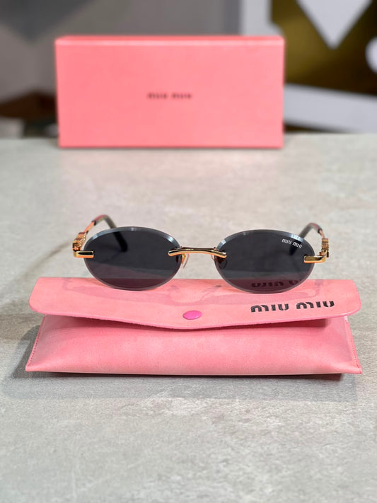 Gafas Miu Miu Ovalada Gris Humo
