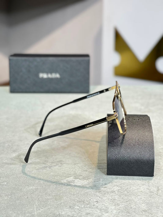 Gafas Prada optica negra dorada, perfil alterno